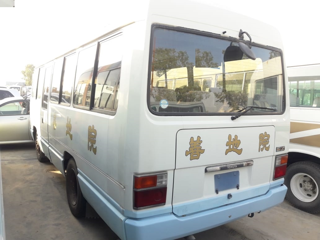 376 - Toyota coaster bus 3.7 MT White & blue