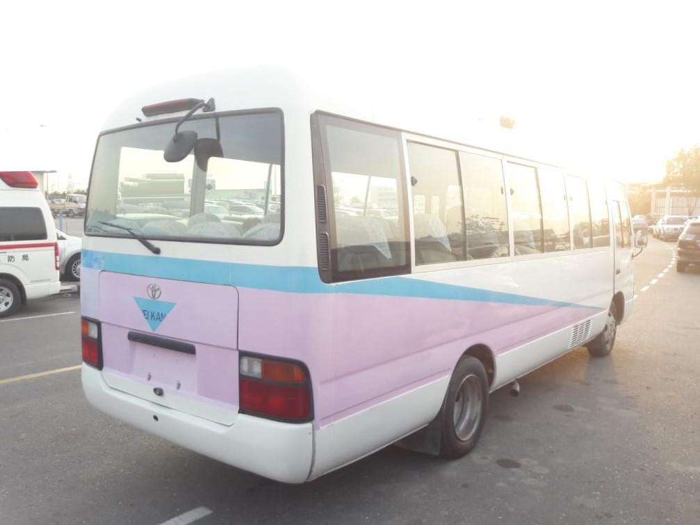 5941 - Toyota coaster bus 4.2 MT  White pink blue